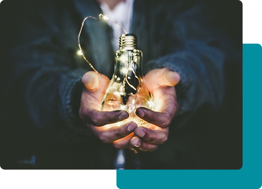 Hands holding a glowing idea
